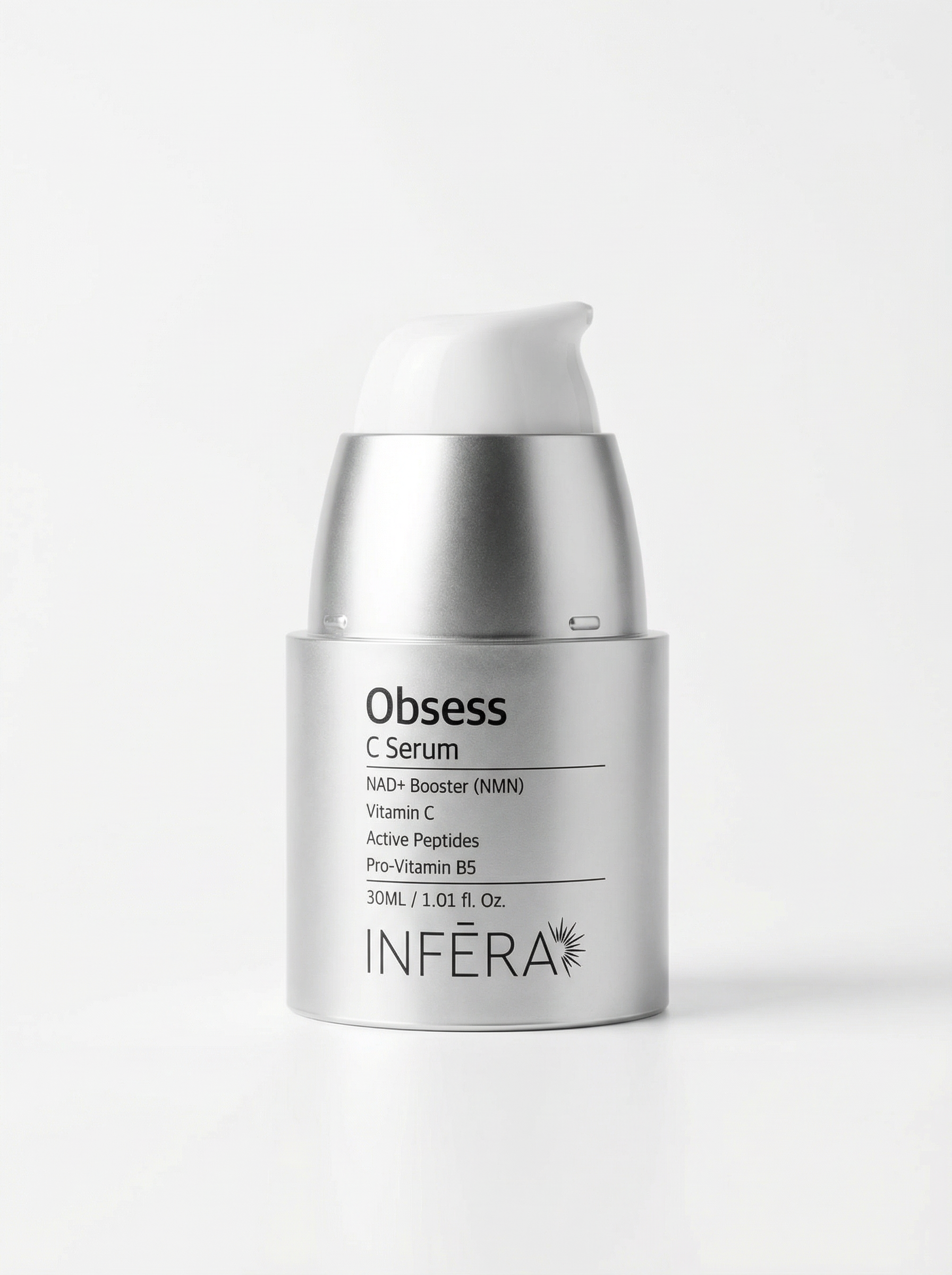 Skincare serum bottle labeled &